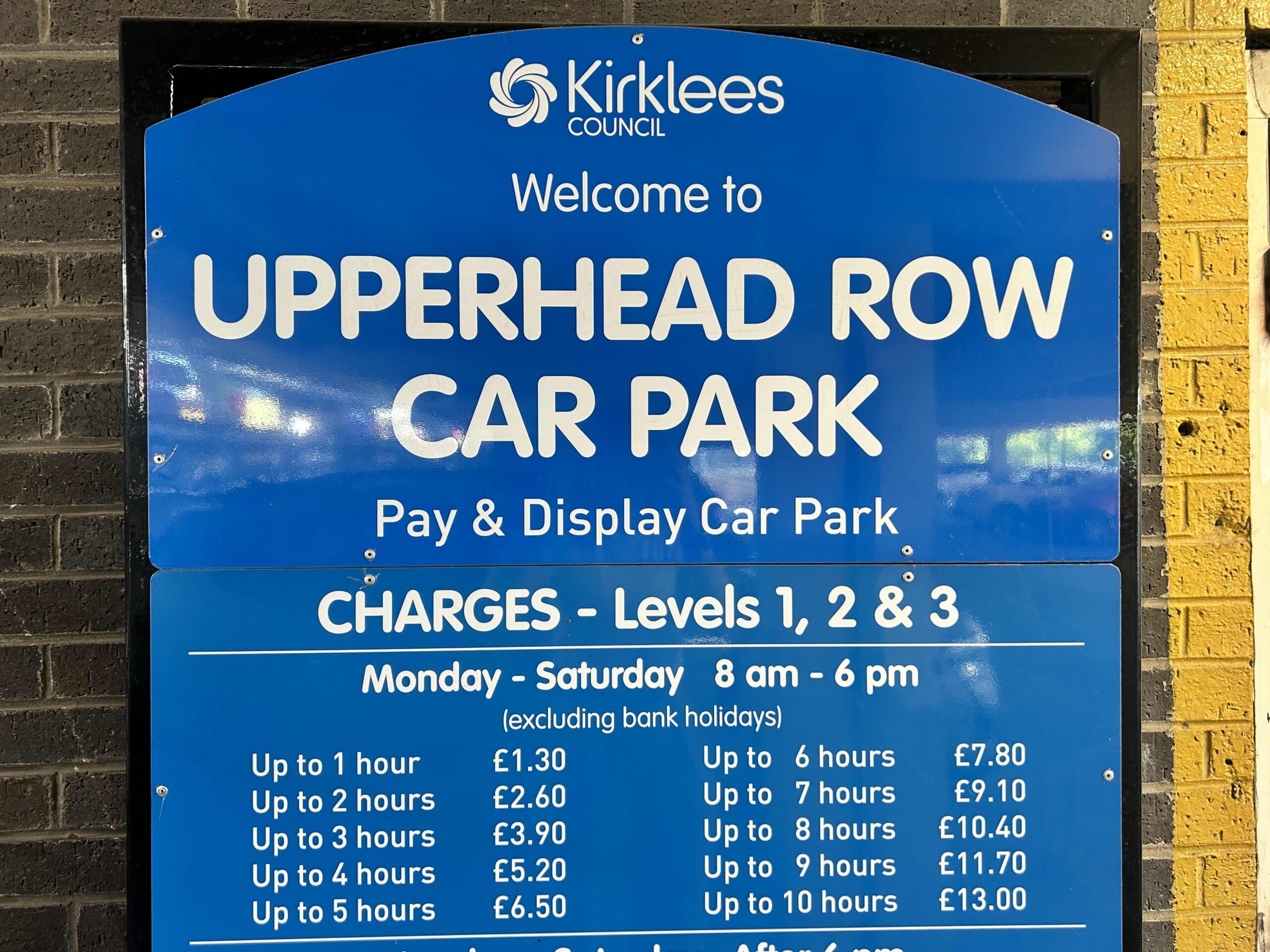 Photograph of parking prices in Upperhead Row Car Park, Huddersfield.